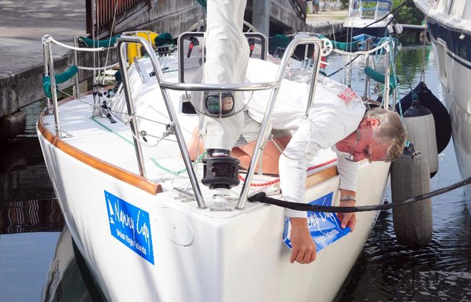 Regatta bow stickers are carefully applied. Ready to race! © Todd VanSickle / BVI Spring Regatta http://www.bvispringregatta.org